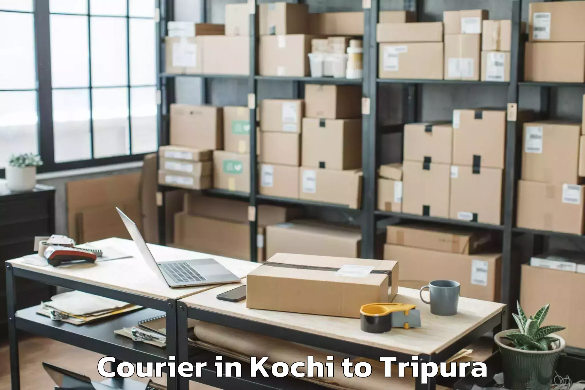 Affordable Kochi to Jampuijala Courier